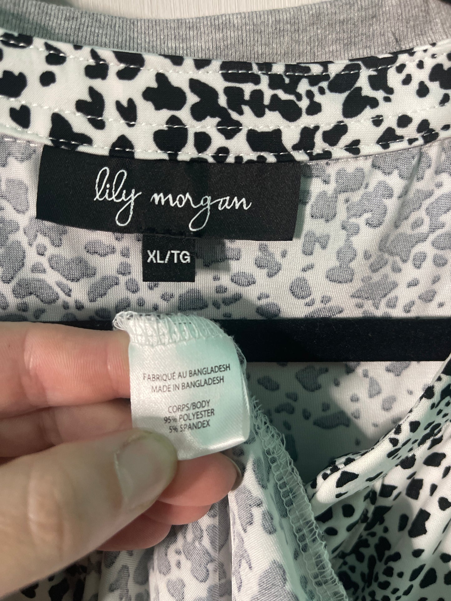 White & Black Leopard Print Sleeveless Blouse