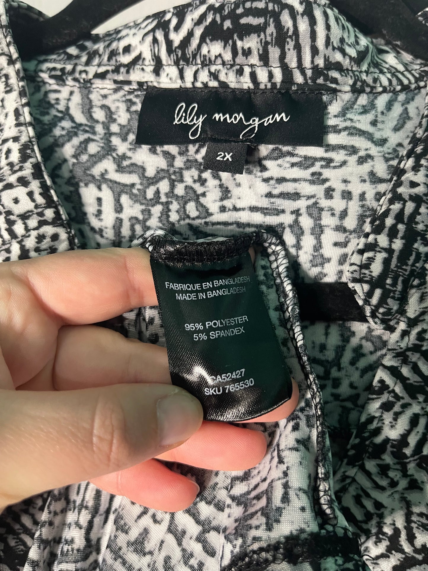 Black and White Sleeveless High Neck Blouse